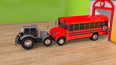 灰色拖拉机和红色校车比力量